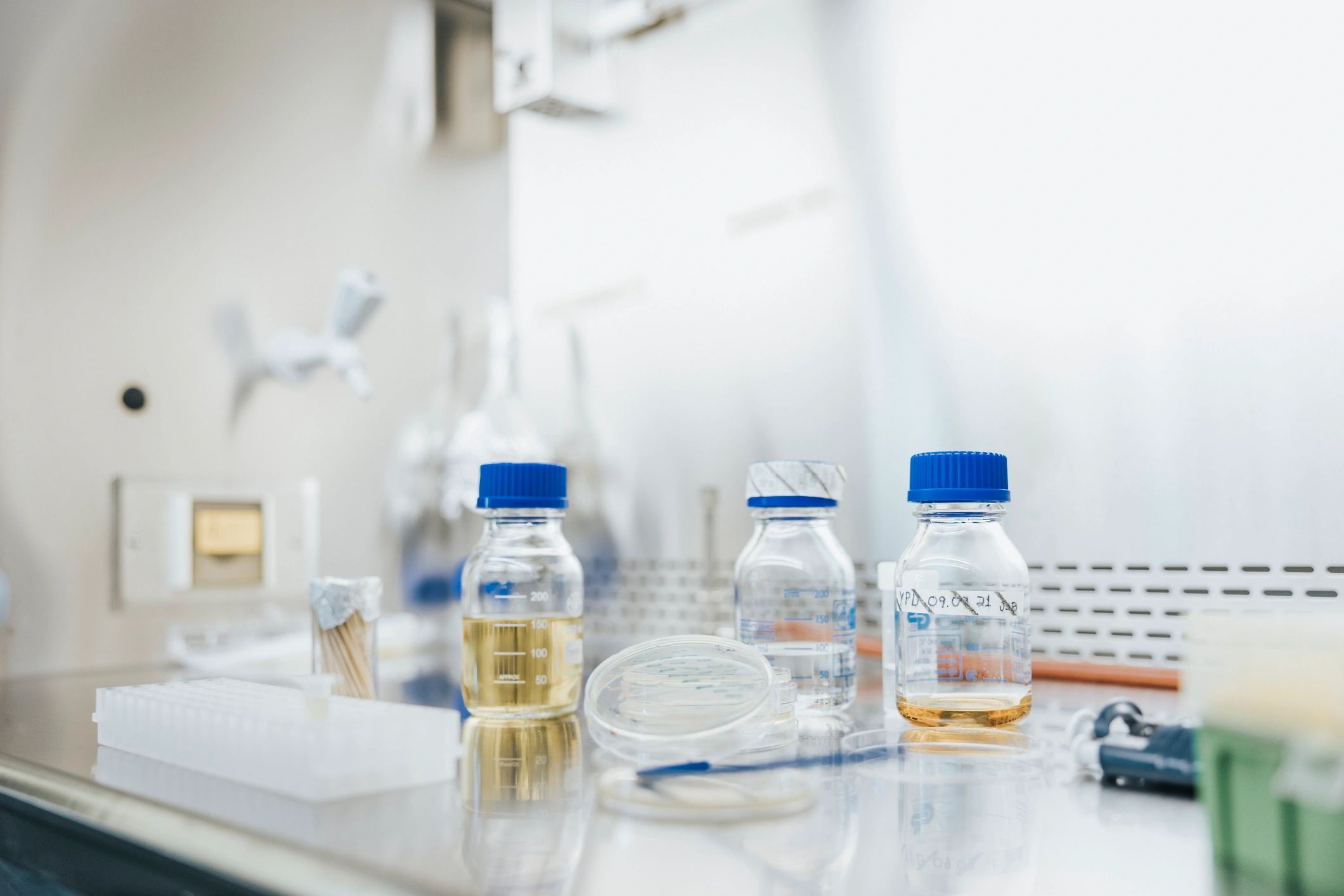 Scientist workplace with lab equipment and computer